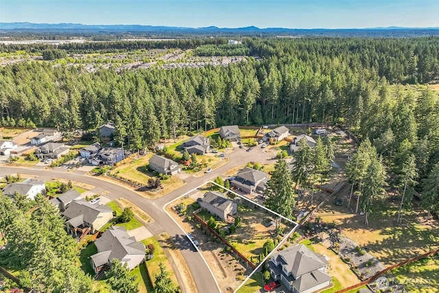 4749 NE Waxwing Ct, Lacey, WA 98516 - aerial view of residential area featuring a mountainous background
