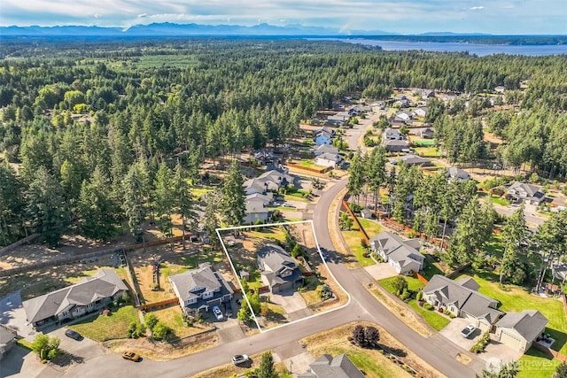 4749 NE Waxwing Ct, Lacey, WA 98516 - aerial perspective of suburban area with property boundaries highlighted and mountains
