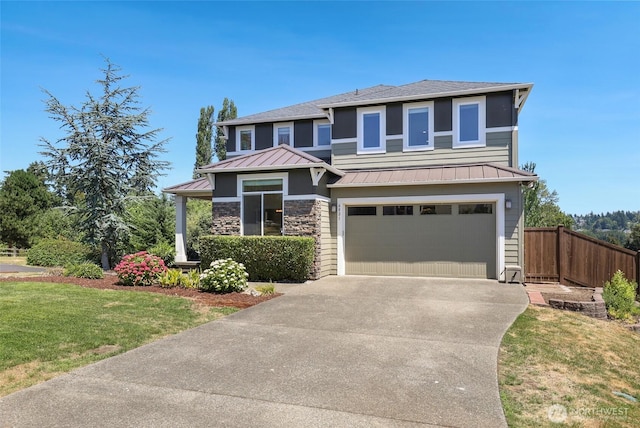 6821 9th St E, Fife, WA 98424 - prairie-style house featuring a standing seam roof, concrete driveway, a metal roof, an attached garage, and roof with shingles