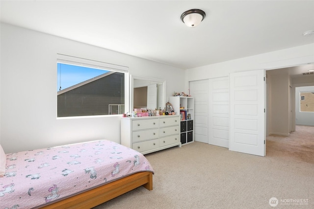 6821 9th St E, Fife, WA 98424 - bedroom featuring light colored carpet and a closet
