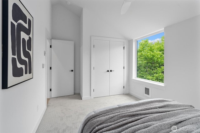 1327 N 185th St Unit A, Shoreline, WA 98133 - bedroom with light colored carpet, lofted ceiling, and a closet