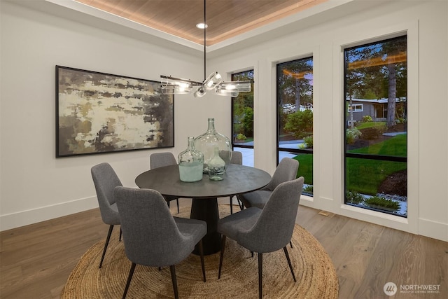 15734 SE 25th St, Bellevue, WA 98008 - dining space featuring wood ceiling, a raised ceiling, wood finished floors, recessed lighting, and a chandelier