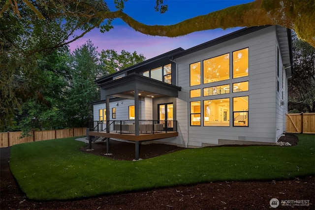 15734 SE 25th St, Bellevue, WA 98008 - back of property at dusk with a deck