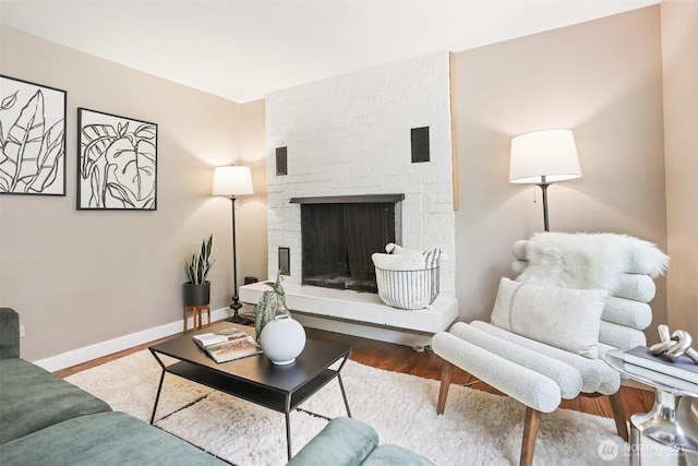 8153 34th Ave SW, Seattle, WA 98126 - living room with wood finished floors and a fireplace