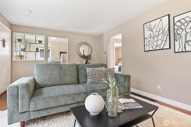 8153 34th Ave SW, Seattle, WA 98126 - living room with wood finished floors and baseboards