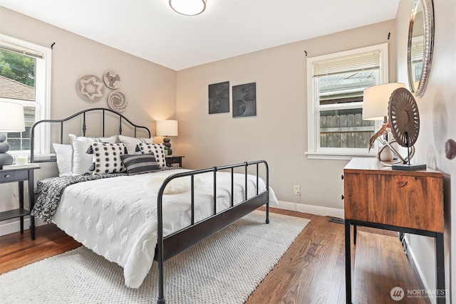 8153 34th Ave SW, Seattle, WA 98126 - bedroom with wood finished floors and baseboards