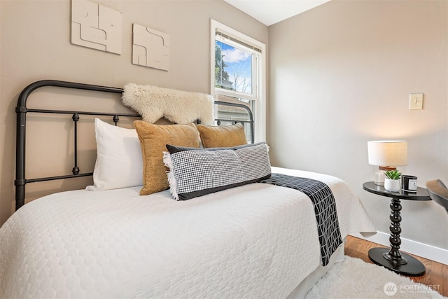 8153 34th Ave SW, Seattle, WA 98126 - bedroom featuring baseboards and wood finished floors