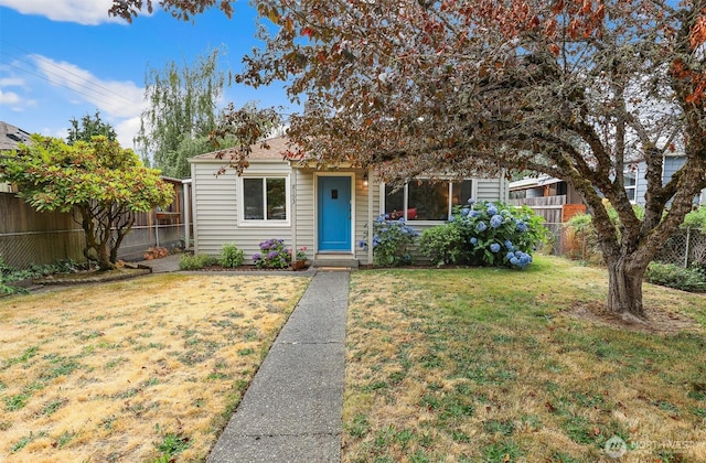8153 34th Ave SW, Seattle, WA 98126 - view of property hidden behind natural elements with a fenced backyard