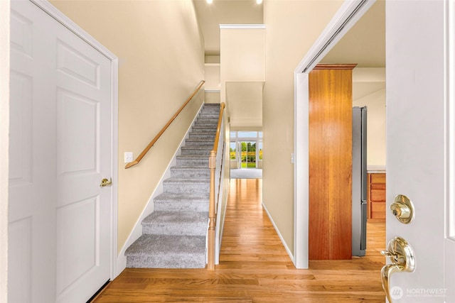 1725 Harrison Pl Unit 104, Lynden, WA 98264 - stairway featuring wood finished floors and baseboards