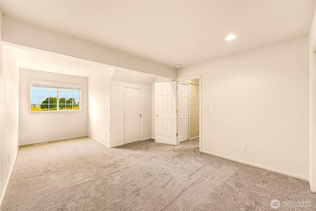 1725 Harrison Pl Unit 104, Lynden, WA 98264 - unfurnished bedroom featuring carpet and recessed lighting