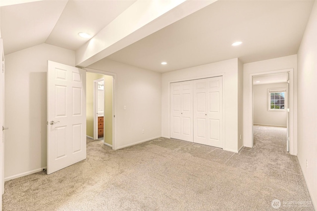 1725 Harrison Pl Unit 104, Lynden, WA 98264 - unfurnished bedroom with light carpet, recessed lighting, a closet, and lofted ceiling