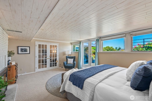 9423 45th Ave SW, Seattle, WA 98136 - carpeted bedroom with french doors and wood ceiling