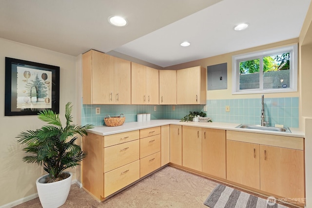 9423 45th Ave SW, Seattle, WA 98136 - kitchen featuring light brown cabinets, light countertops, electric panel, tasteful backsplash, and recessed lighting