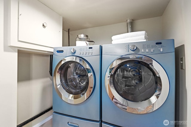 9423 45th Ave SW, Seattle, WA 98136 - laundry room with cabinet space and separate washer and dryer