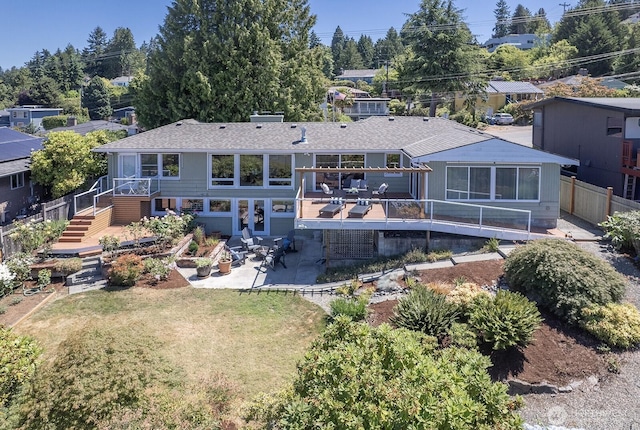 9423 45th Ave SW, Seattle, WA 98136 - rear view of property featuring stairway, a patio area, a deck, and a shingled roof
