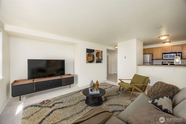 300 10th Ave Unit A310, Seattle, WA 98122 - living room with baseboards and light carpet