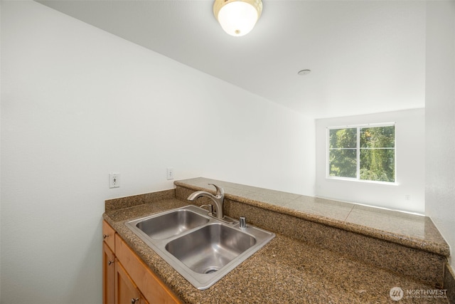 300 10th Ave Unit A310, Seattle, WA 98122 - kitchen featuring a sink and brown cabinetry