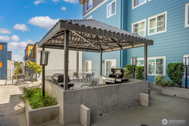 300 10th Ave Unit A310, Seattle, WA 98122 - view of patio with an outdoor kitchen and a gazebo