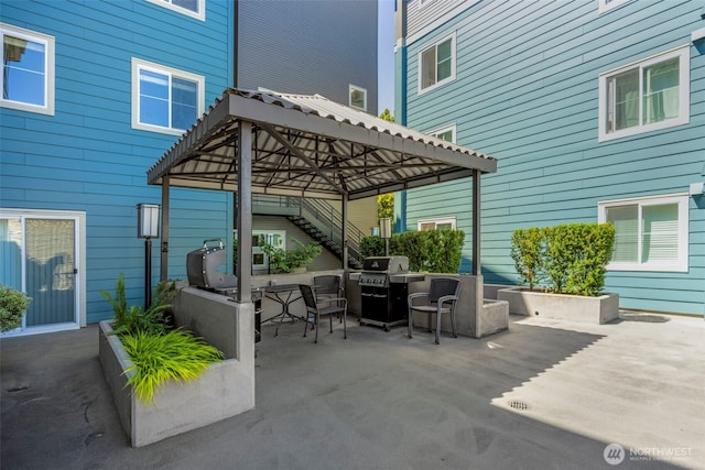 300 10th Ave Unit A310, Seattle, WA 98122 - view of patio / terrace with a grill