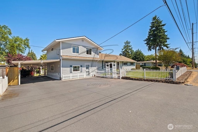 1727 E 64th St, Tacoma, WA 98404 - view of front facade with asphalt driveway and a carport