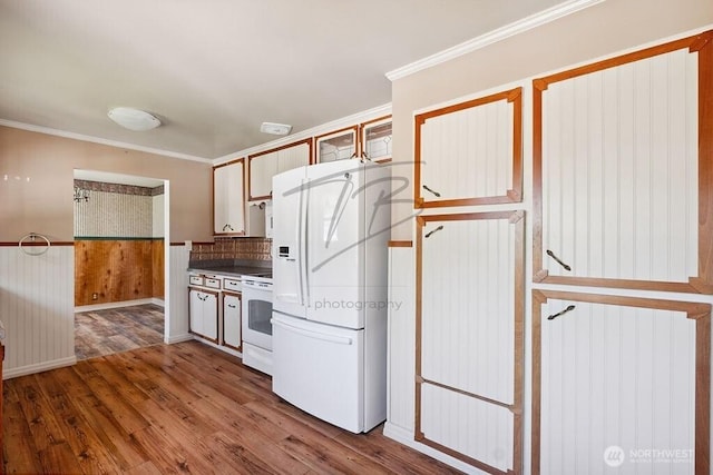 1727 E 64th St, Tacoma, WA 98404 - kitchen featuring white appliances, wood finished floors, ornamental molding, and tasteful backsplash