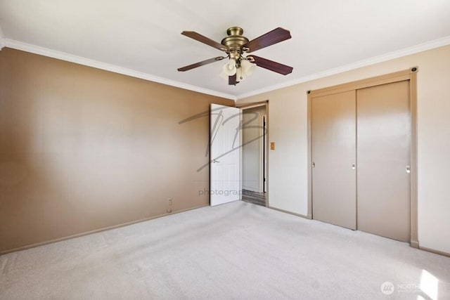 1727 E 64th St, Tacoma, WA 98404 - unfurnished bedroom with crown molding, light carpet, a closet, and ceiling fan