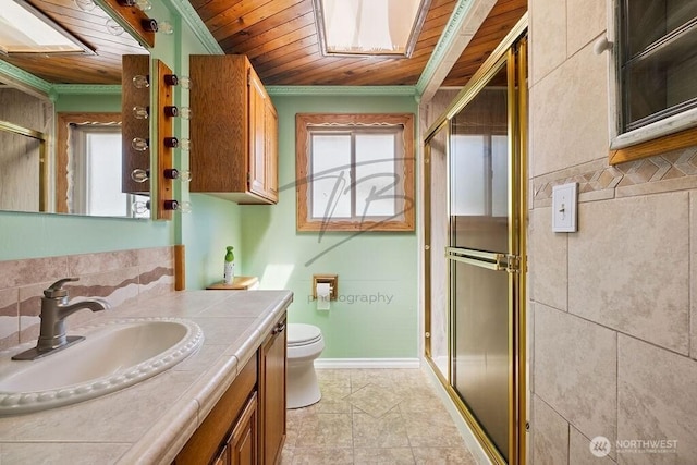 1727 E 64th St, Tacoma, WA 98404 - full bath featuring wooden ceiling, plenty of natural light, ornamental molding, vanity, and a stall shower