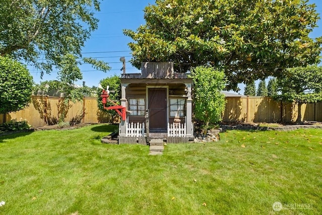 1727 E 64th St, Tacoma, WA 98404 - view of shed featuring a fenced backyard