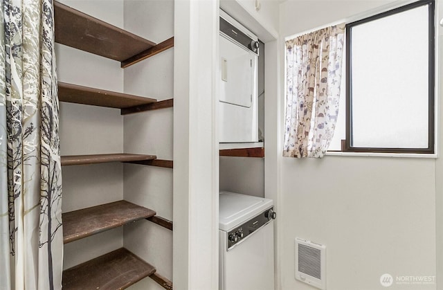 1200 Lenora Ct, Bellingham, WA 98225 - pantry featuring stacked washer / drying machine and heating unit