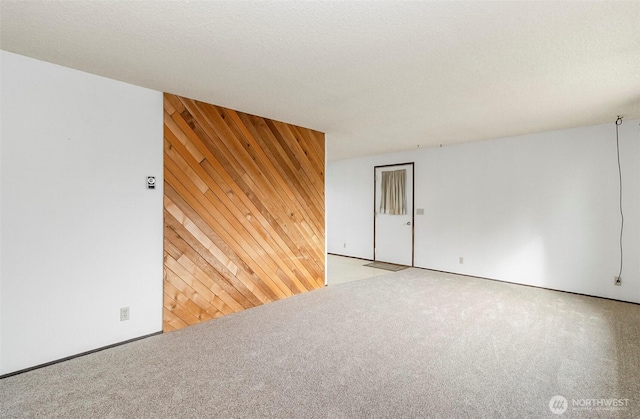 1200 Lenora Ct, Bellingham, WA 98225 - carpeted spare room featuring wooden walls