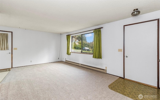 1200 Lenora Ct, Bellingham, WA 98225 - unfurnished room featuring a baseboard radiator and carpet