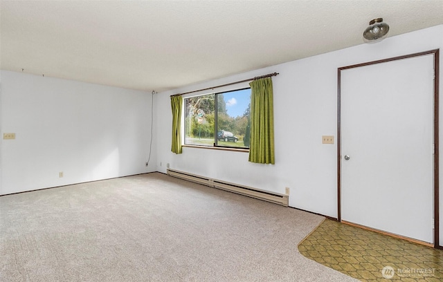 1200 Lenora Ct, Bellingham, WA 98225 - unfurnished room featuring a baseboard radiator and carpet floors