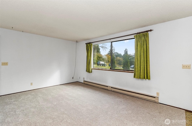 1200 Lenora Ct, Bellingham, WA 98225 - spare room with a baseboard heating unit and carpet floors