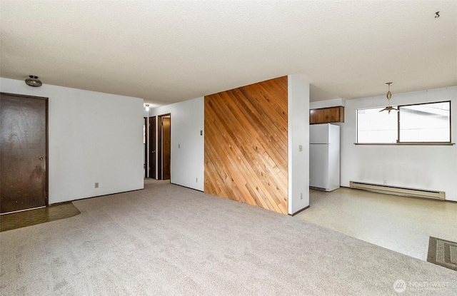 1200 Lenora Ct, Bellingham, WA 98225 - unfurnished living room featuring a baseboard radiator and wood walls