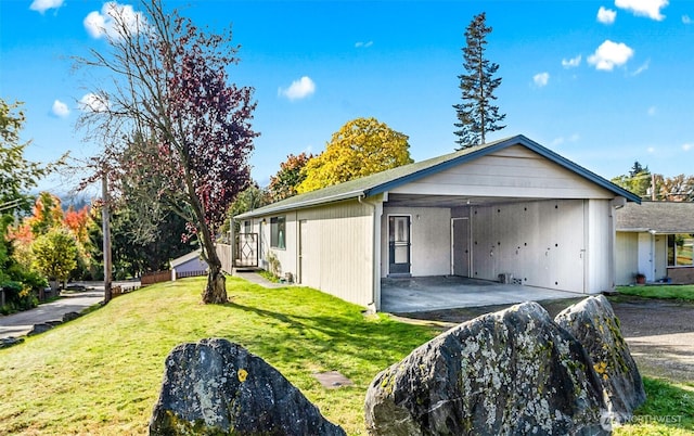 1200 Lenora Ct, Bellingham, WA 98225 - view of property exterior with a lawn and a carport