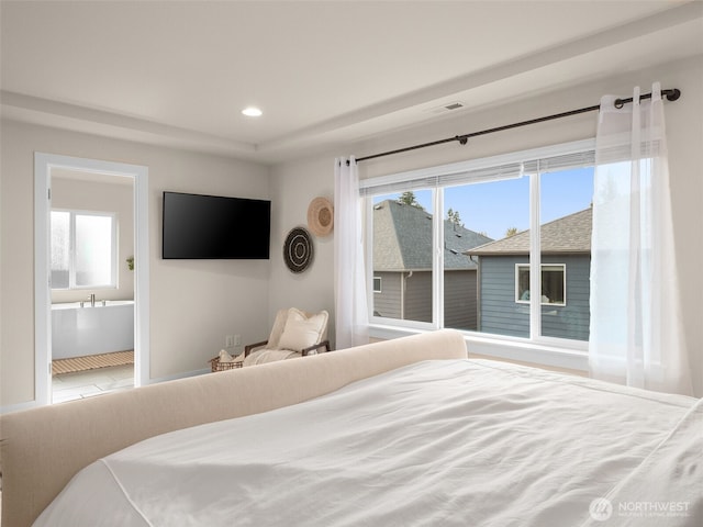 4419 141st Pl SE, Snohomish, WA 98296 - bedroom with multiple windows, ensuite bath, and recessed lighting