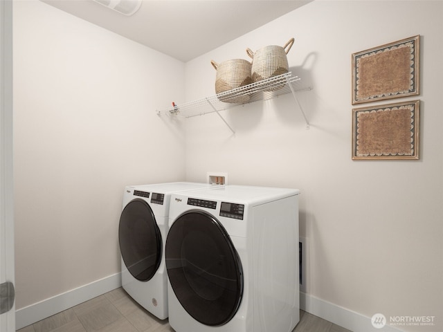 4419 141st Pl SE, Snohomish, WA 98296 - laundry room with washing machine and dryer and baseboards