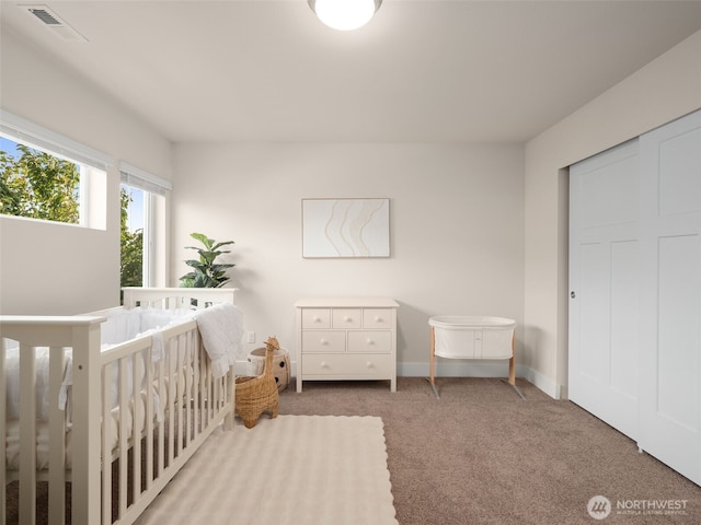 4419 141st Pl SE, Snohomish, WA 98296 - carpeted bedroom with a nursery area and baseboards