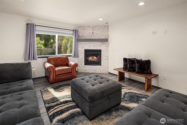 830 Mill Ave, Snohomish, WA 98290 - living area with wood finished floors, a stone fireplace, and recessed lighting