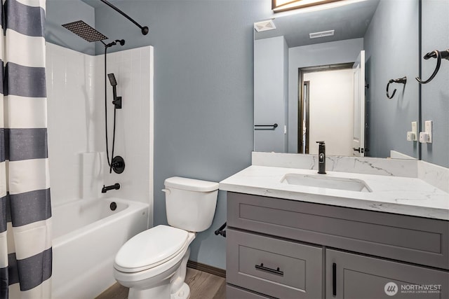 830 Mill Ave, Snohomish, WA 98290 - full bathroom with vanity, shower / bath combo, and wood finished floors