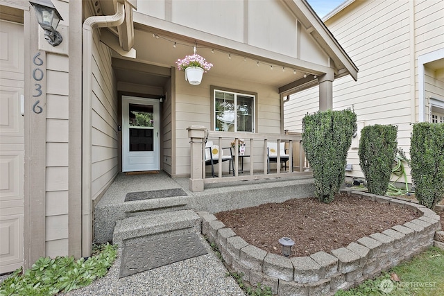 6036 Park St E, Fife, WA 98424 - doorway to property featuring covered porch