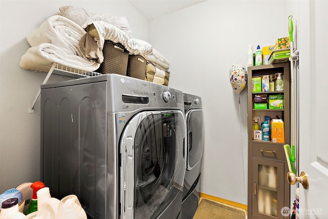 6036 Park St E, Fife, WA 98424 - laundry area featuring washer and clothes dryer and baseboards