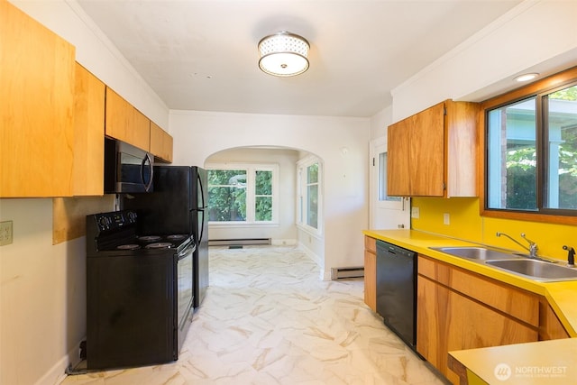 314 E 2nd St, Port Angeles, WA 98362 - kitchen with black appliances, light marble finish floors, arched walkways, a baseboard heating unit, and healthy amount of natural light