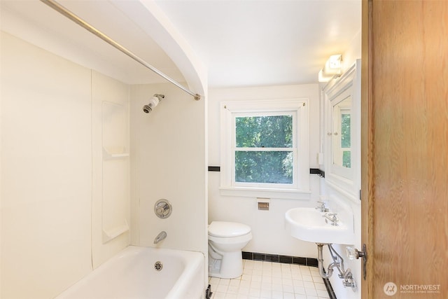 314 E 2nd St, Port Angeles, WA 98362 - bathroom with shower / washtub combination and tile patterned floors