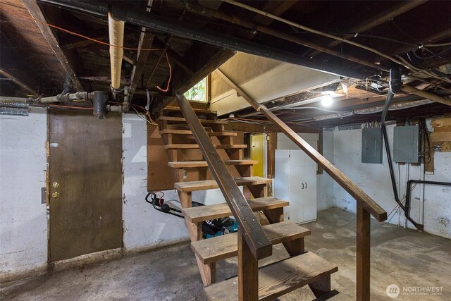 314 E 2nd St, Port Angeles, WA 98362 - unfinished below grade area featuring electric panel and stairs