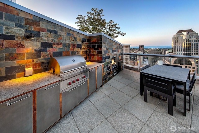 1521 2nd Ave Unit 3801, Seattle, WA 98101 - view of patio with an outdoor kitchen