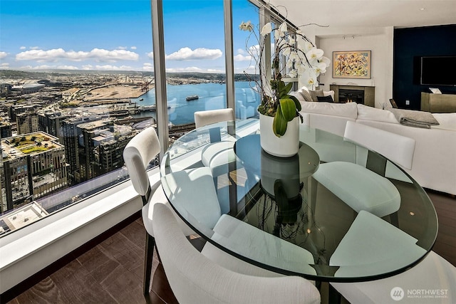 1521 2nd Ave Unit 3801, Seattle, WA 98101 - dining space featuring a warm lit fireplace