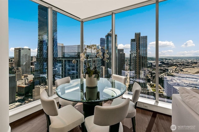 1521 2nd Ave Unit 3801, Seattle, WA 98101 - sunroom featuring plenty of natural light and a skyline view