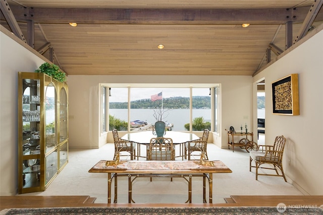 4802 E Mercer Way, Mercer Island, WA 98040 - carpeted dining area featuring a water view, a wooden ceiling with exposed beams, and high vaulted ceiling