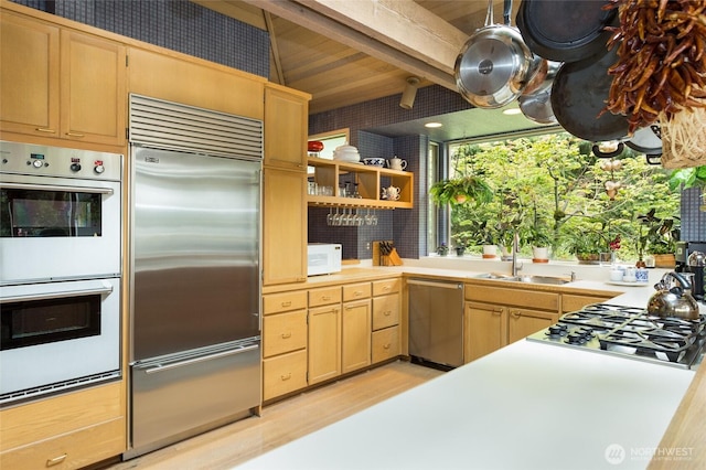 4802 E Mercer Way, Mercer Island, WA 98040 - kitchen with appliances with stainless steel finishes, light brown cabinets, light countertops, light wood-type flooring, and open shelves